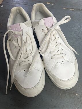 On cloud Running White Leather Sneakers with Light Pink Tongue.  The Roger.